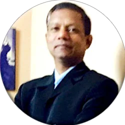 Dr. Vasudev T